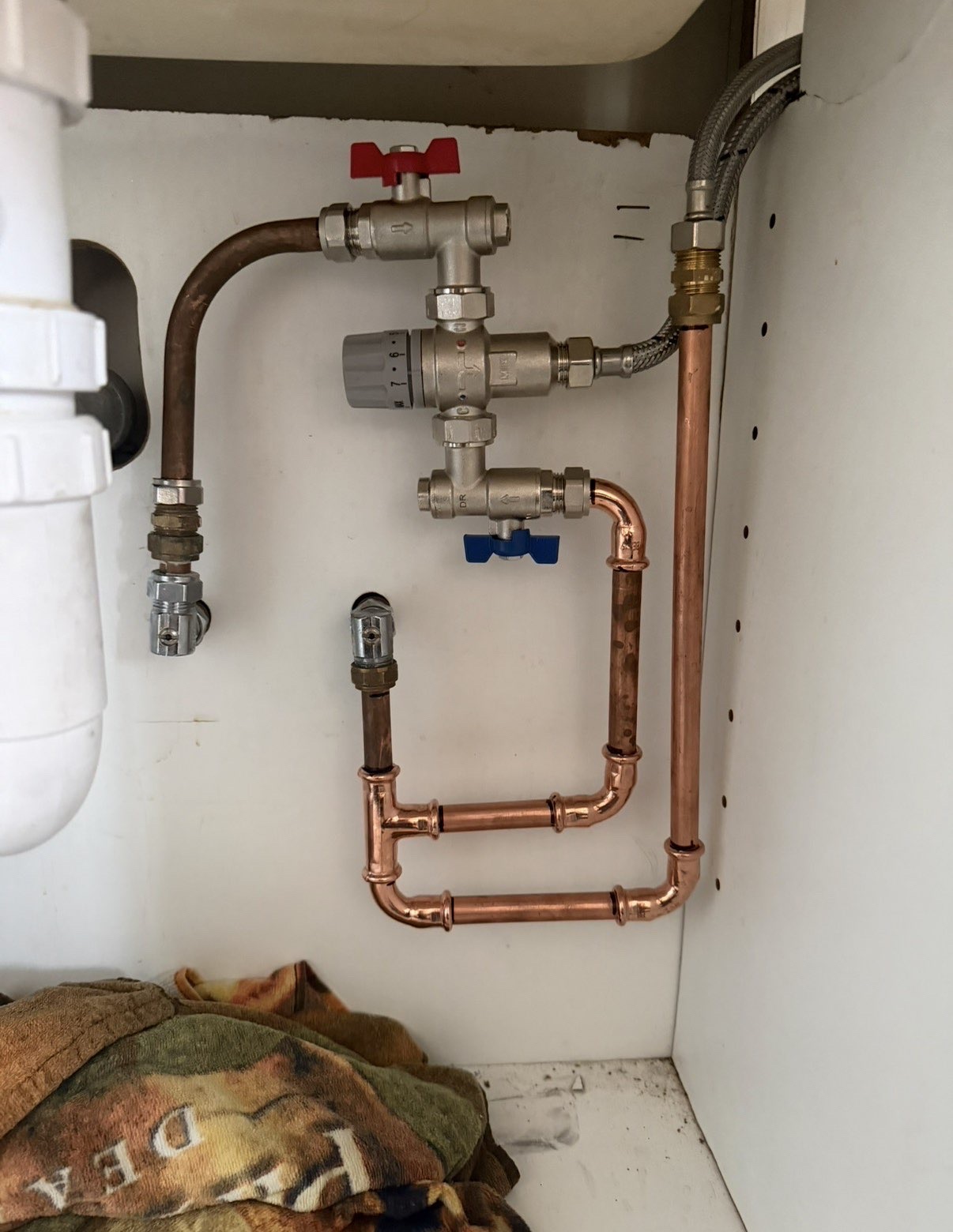 Thermostatic mixing valve and isolation valves under-sink